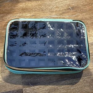 Teal essential oil or nail polish organizer